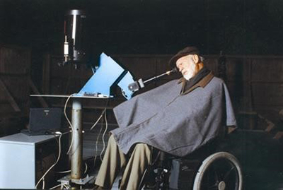 person in wheelchair using the accessible telescope