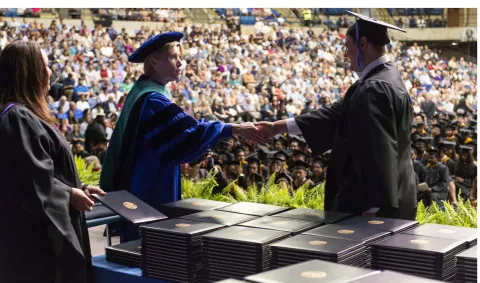 Hundreds of students graduate during the 47th annual UIS commencement ceremonies in downtown Springfield